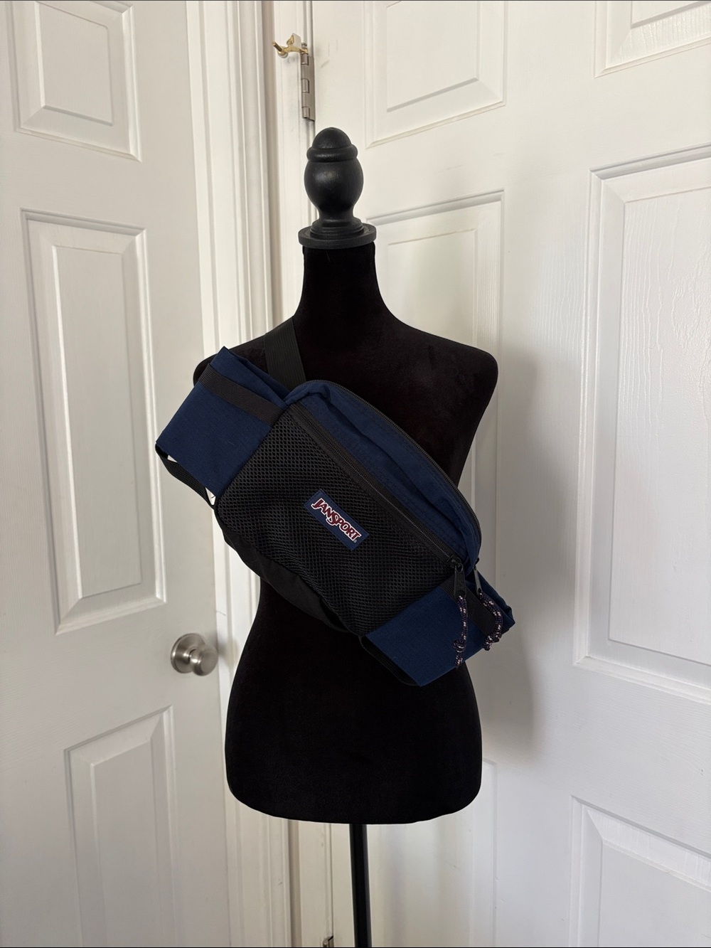 Vintage 1990s JanSport navy blue hiking belt pack.